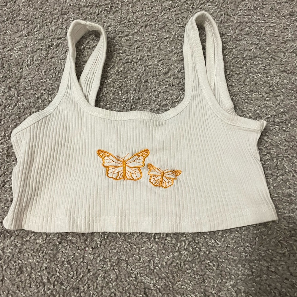 white crop top with orange butterflies